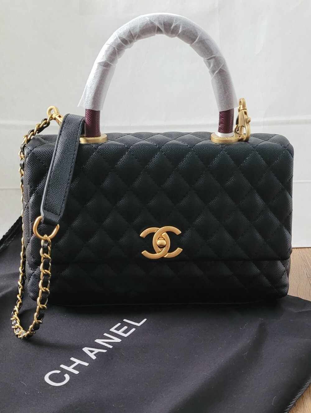 Black Quilted Leather Top-Handle Shoulder Bag with Gold Hardware